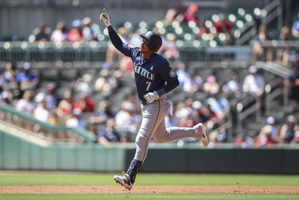 Seattle Mariners' Jorge Polanco runs the bases after hitting a two-run home run in the third inning of a baseball game against the Atlanta Braves, Sunday, Sept. 7, 2025, in Atlanta. (AP Photo/Colin Hubbard)