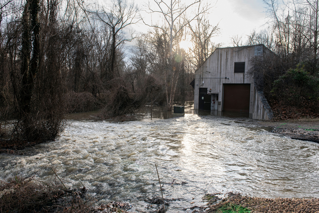 Raw sewage floods a service building after a massive sewage pipe rupture in Glen Echo, Md., Friday, Jan. 23, 2026. (AP Photo/Cliff Owen)