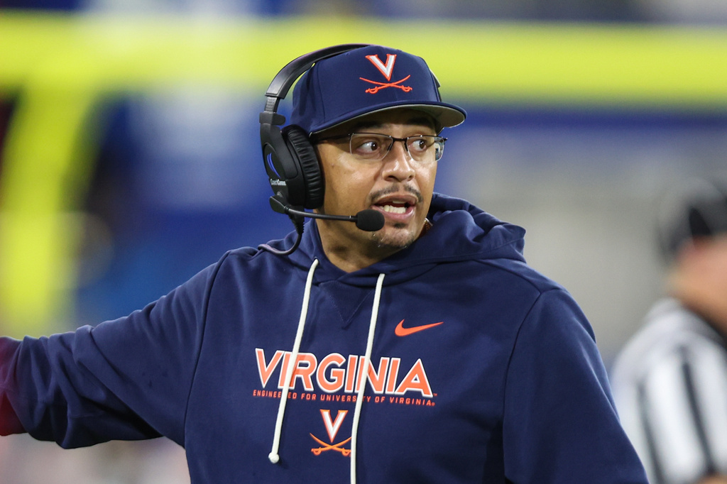 FILE - Virginia head coach Tony Elliott walks the sideline against Missouri during the second quarter of a Gator Bowl NCAA college football game in Jacksonville, Fla., Dec. 27, 2025. (AP Photo/Gary McCullough, File)