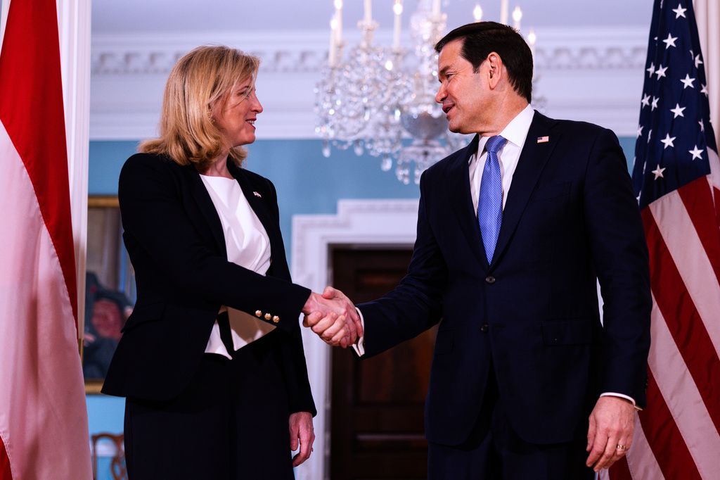 Secretary of State Marco Rubio arrives with Austrian Foreign Minister Beate Meinl-Reisinger, to the Treaty Room at the State Department, Tuesday, Aug. 11, 2026, in Washington. (AP Photo/Tierney L. Cross)
