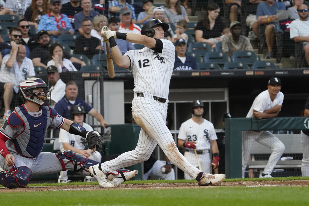 Chicago White Sox's Colson Montgomery hits a grand slam against the Minnesota Twins during the second inning of a baseball game Saturday, August 23, 2025, in Chicago. (AP Photo/David Banks)