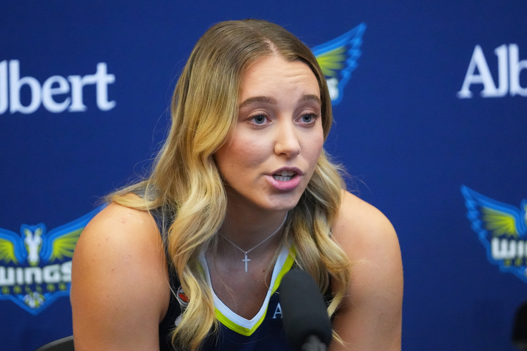 Dallas Wings' Paige Bueckers speaks to reporters during the team's WNBA basketball media day Monday, April 27, 2026, in Arlington, Texas. (AP Photo/Julio Cortez)