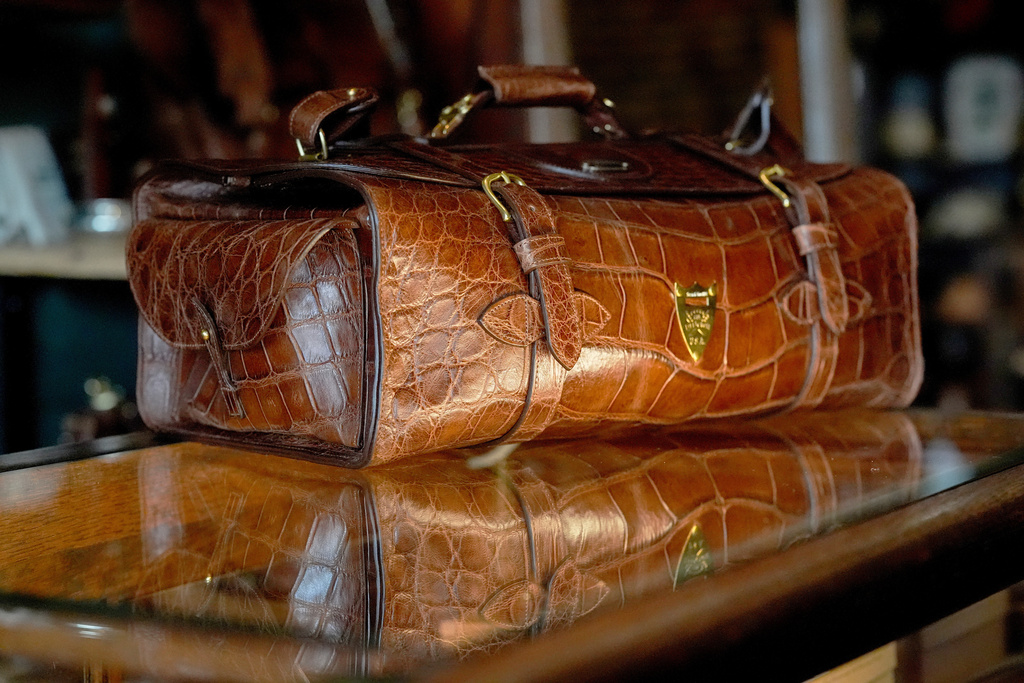 A No. 2 Duffel Bag made from American alligator is displayed at the Col. Littleton leather goods store Friday, March 6, 2026, in Lynnville, Tenn. (AP Photo/George Walker IV)