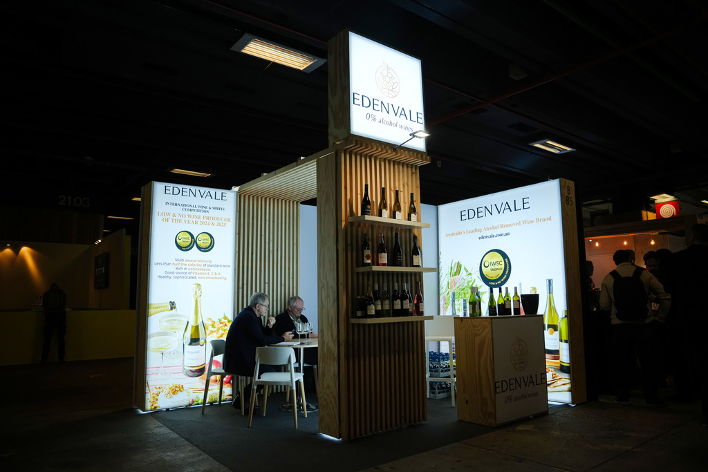 Producers of non-alcoholic wines present their products at the Wine Paris 2026 fair, at the Porte de Versailles exhibition center in Paris, France, Tuesday, Feb. 10, 2026. (AP Photo/Aurelien Morissard)
