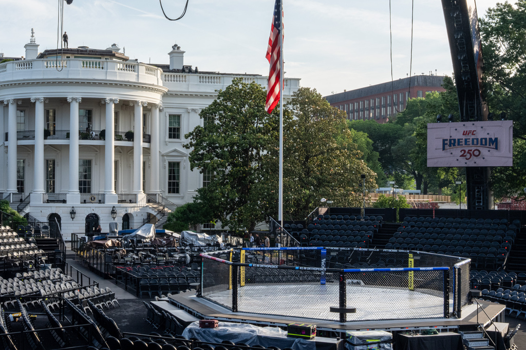 Members of the media view the arena for the UFC Freedom 250 fights on the South Lawn of the White House, Thursday, June 11, 2026, in Washington. (AP Photo/Alex Brandon)