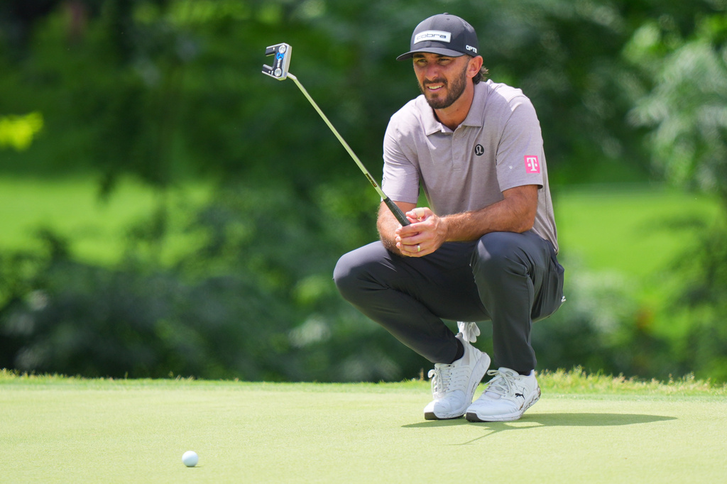 Brian Harman lines up a putt on the eighth hole during the first round of the Charles Schwab Challenge golf tournament at Colonial Country Club in Fort Worth, Texas, Thursday, May 28, 2026. (AP Photo/LM Otero)