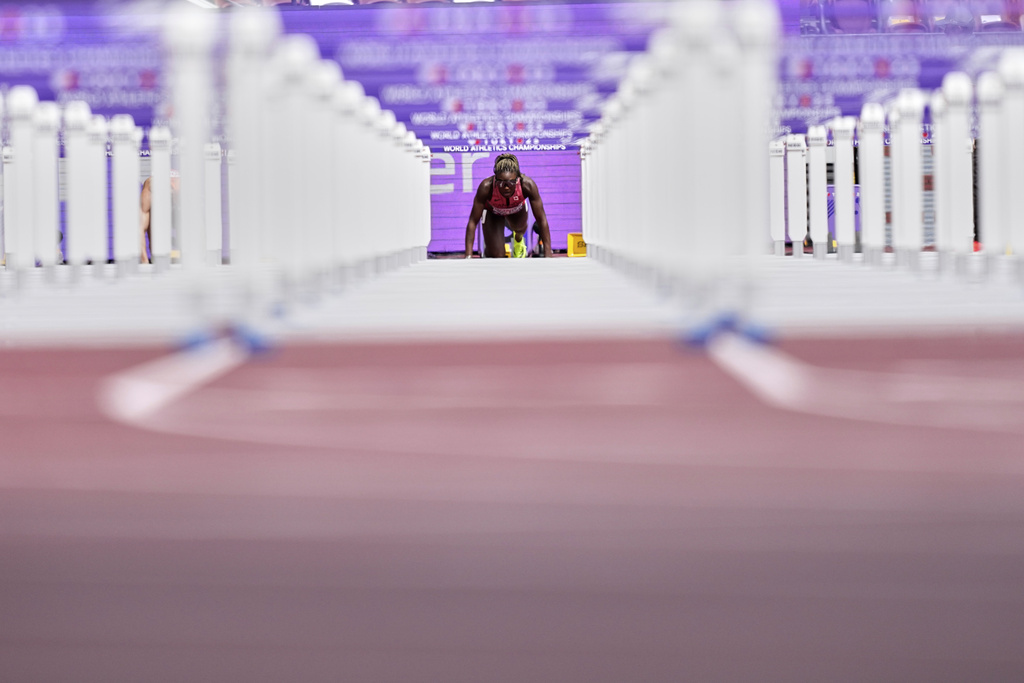 Canada's Mariam Abdul-Rashid prepares to start a women's 100 meters hurdles heat at the World Athletics Championships in Tokyo, Sunday, Sept. 14, 2025. (AP Photo/Petr David Josek)