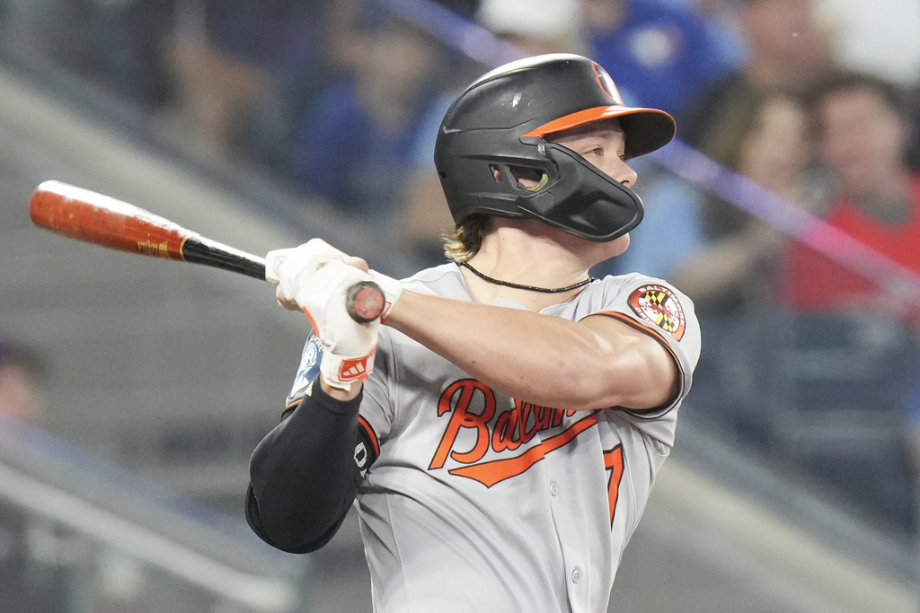 Baltimore Orioles' Jackson Holliday (7) hits an RBI single against the Toronto Blue Jays during third inning MLB baseball action in Toronto, Friday Sept. 12, 2025. (Chris Young/The Canadian Press via AP)