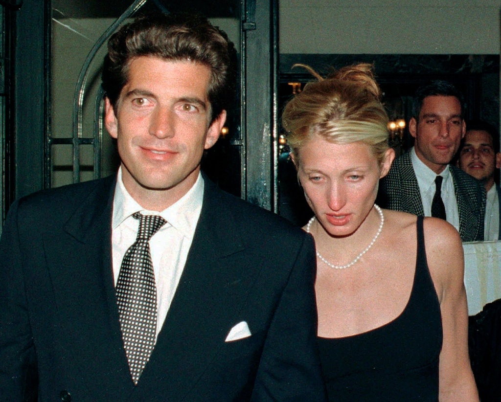 FILE - John F. Kennedy Jr., and his wife Carolyn Bessette Kennedy leave a party in New York on Oct. 10, 1996. (AP Photo/Douglas Healey, File)