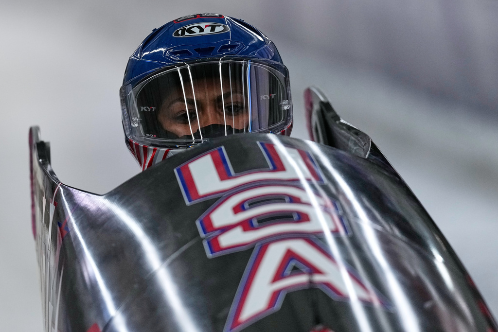 United States' Kaysha Love starts for a women's monobob run at the 2026 Winter Olympics, in Cortina d'Ampezzo, Italy, Sunday, Feb. 15, 2026. (AP Photo/Aijaz Rahi)