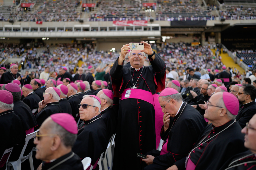Bishops wait the arrival of Pope Leo XIV to attend a prayer vigil at Lluis Companys Olympic Stadium in Barcelona, Spain, Tuesday, June 9, 2026. (AP Photo/Bernat Armangue)