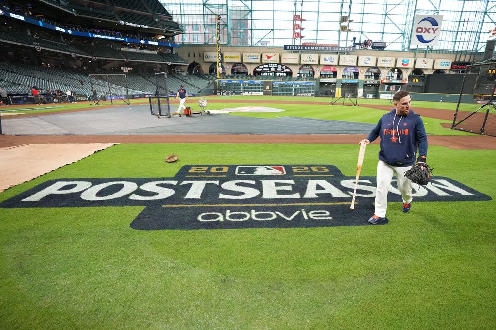 Houston Astros catcher Christian Vazquez walks across the field before Game 1 of baseball's American League Wild Card Series against the Chicago White Sox, Tuesday, Sept. 29, 2026, in Houston. (AP Photo/Karen Warren