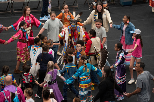 FILE - People participate during the BraveNation Powwow and Gather at UNC Pembroke, March 22, 2025, in Pembroke, N.C. (AP Photo/Allison Joyce, File) FILE - People participate during the BraveNation Powwow and Gather at UNC Pembroke, March 22, 2025, in Pembroke, N.C. (AP Photo/Allison Joyce, File)