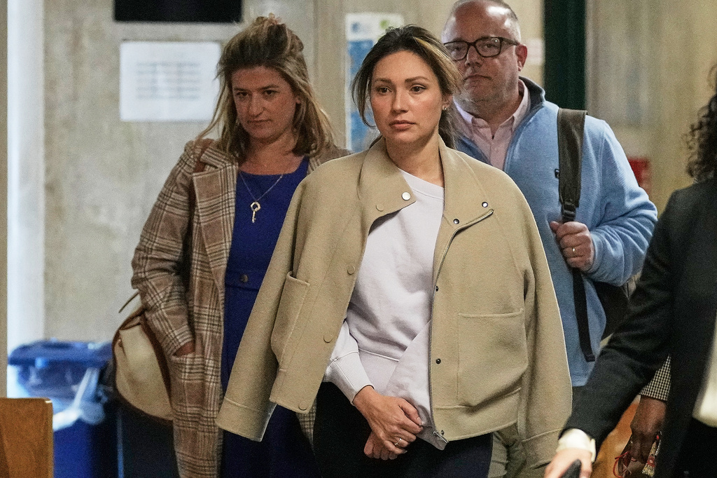 Jessica Mann, center, arrives for Harvey Weinstein's trial in criminal court in New York, Monday, April 27, 2026. (AP Photo/Richard Drew)