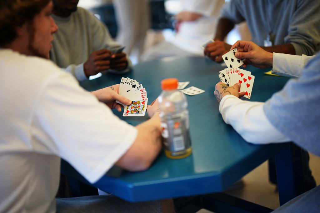 People who are incarcerated play cards at a Minnesota Correctional Facility in Lino Lakes, Minn., Tuesday, Sept. 15, 2026. (AP Photo/Ellen Schmidt)