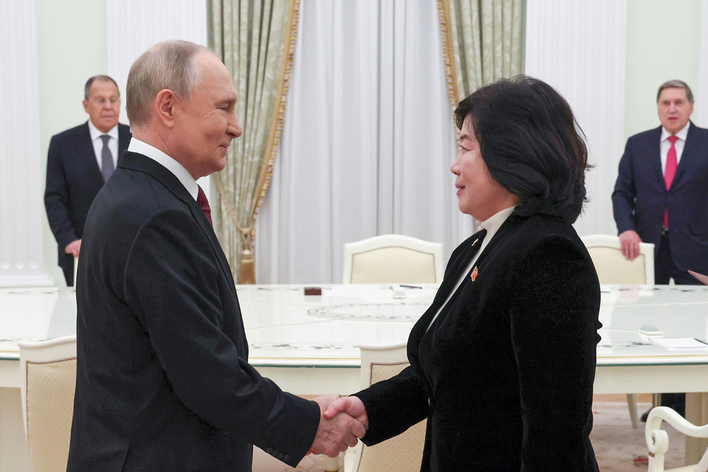 Russian President Vladimir Putin shakes hands with North Korean Foreign Minister Choe Son Hui during their meeting at the Kremlin in Moscow, Russia, Monday, Oct. 27, 2025. (Vyacheslav Prokofyev, Sputnik, Kremlin Pool Photo via AP)