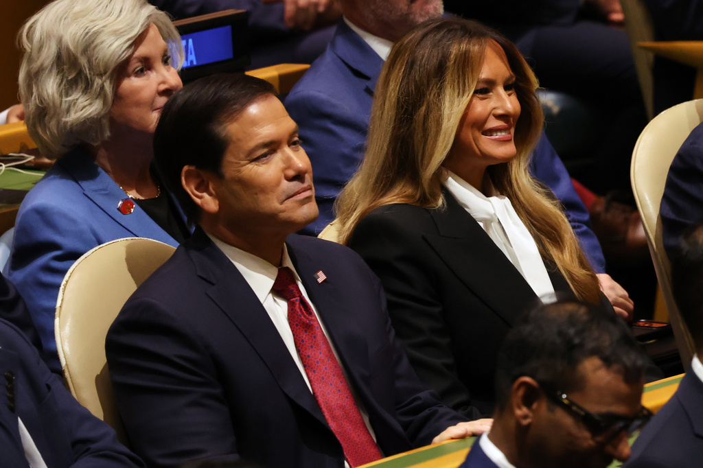 United States Secretary of State Marco Rubio, left, and United States first lady Melania Trump listen as United States President Donald Trump speaks during the 81st session of the United Nations General Assembly at United Nations headquarters, Tuesday, Sept. 22, 2026. (AP Photo/Heather Khalifa)