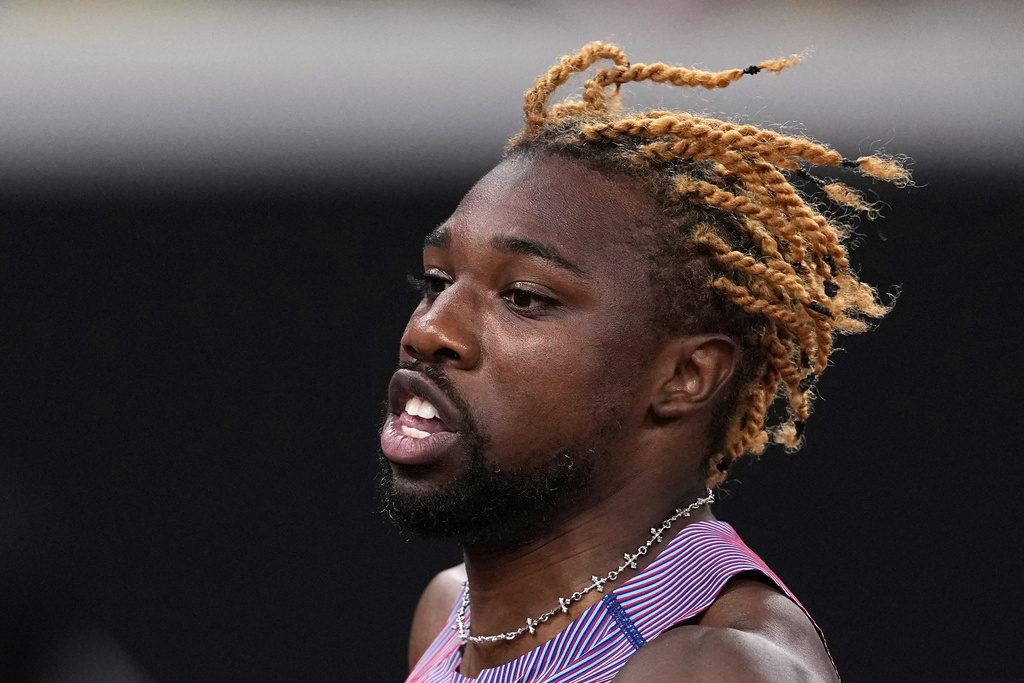 United States' Noah Lyles competes in a men's 100 meters heat at the World Athletics Championships in Tokyo, Saturday, Sept. 13, 2025. (AP Photo/Matthias Schrader)