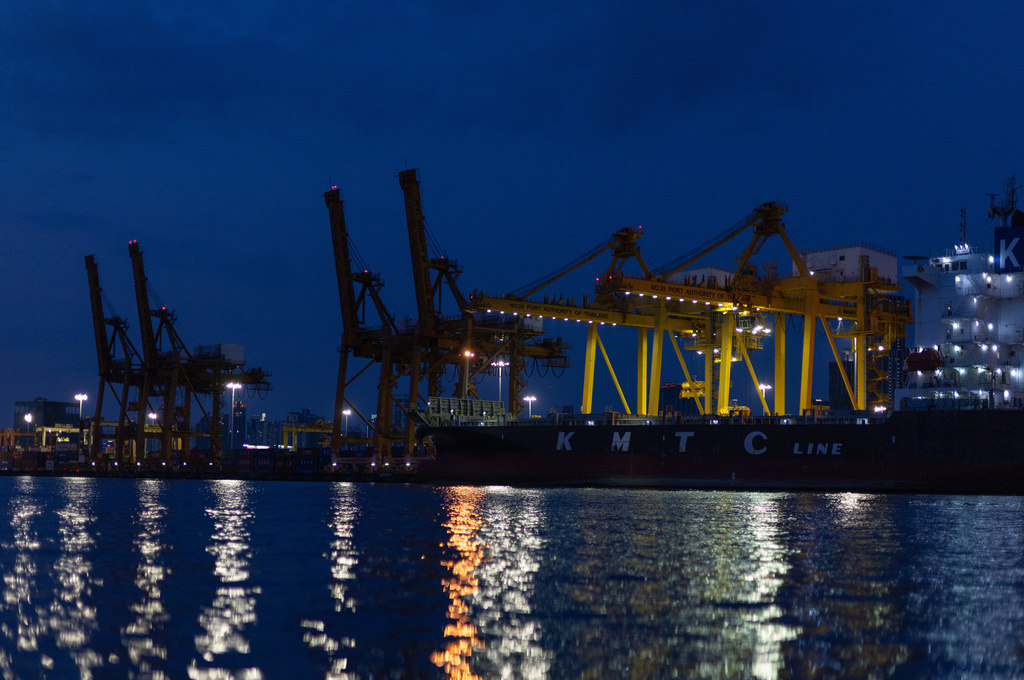 Night lights from Khlong Toei Pier shimmer on the Chao Phraya River in Bangkok, Thailand on Jan. 3, 2026. (AP Photo/Anton L. Delgado)
