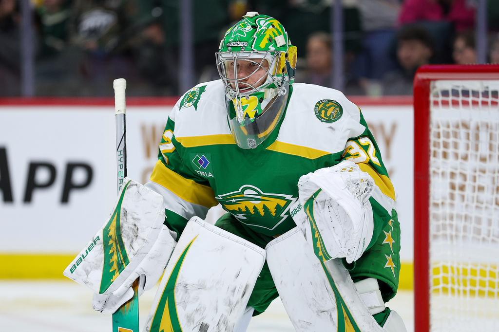 Minnesota Wild goaltender Filip Gustavsson defends his net against the Vancouver Canucks during the second period of an NHL hockey game Thursday, April 2, 2026, in St. Paul, Minn. (AP Photo/Matt Krohn)