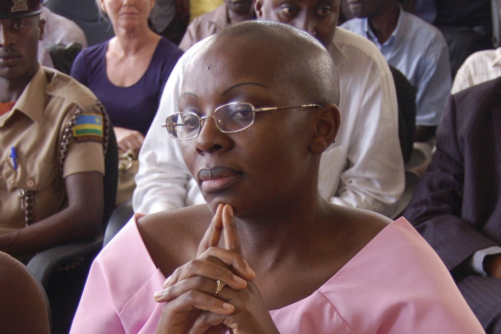 FILE - Rwandan opposition leader Victoire Ingabire listens to the judge during her trial Sept. 5, 2011, in Kigali, Rwanda. (AP Photo/Shant Fabricatorian, File)
