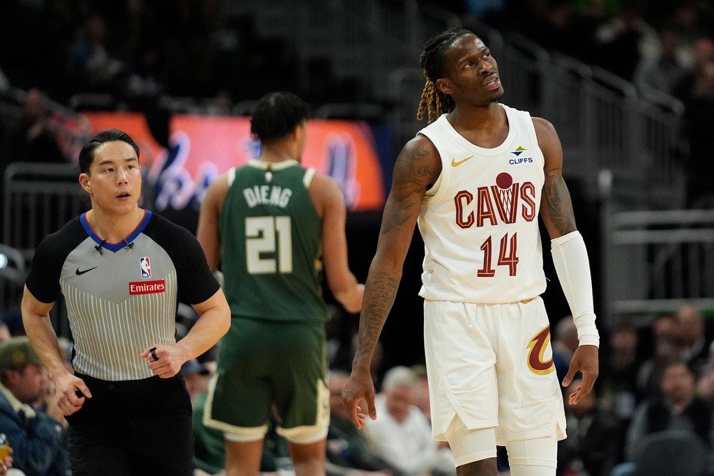 Cleveland Cavaliers' Keon Ellis (14) reacts during the second half of an NBA basketball game against the Milwaukee Bucks, Wednesday, Feb. 25, 2026, in Milwaukee. (AP Photo/Aaron Gash)