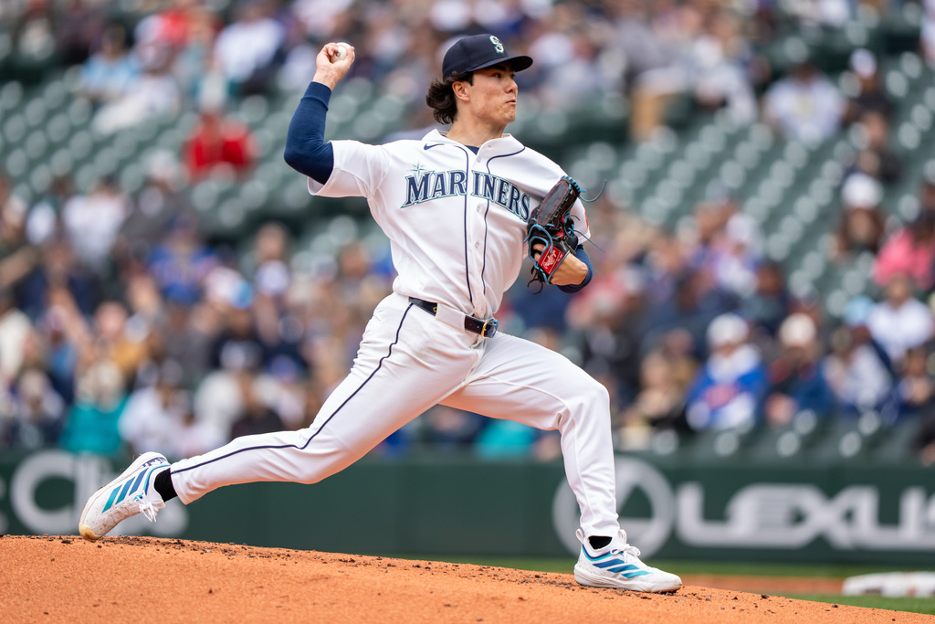 Seattle Mariners starter Bryan Woo delivers a pitch during the second inning of a baseball game against the Atlanta Braves, Wednesday, May 6, 2026, in Seattle. (AP Photo/Stephen Brashear)