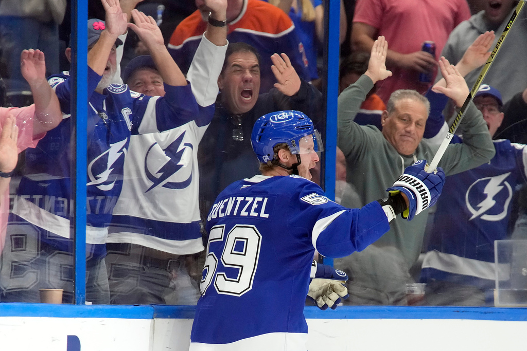 Tampa Bay Lightning center Jake Guentzel (59) after scoring the game-winning goal against the Edmonton Oilers during overtime of an NHL hockey game Thursday, Nov. 20, 2025, in Tampa, Fla. (AP Photo/Chris O'Meara)