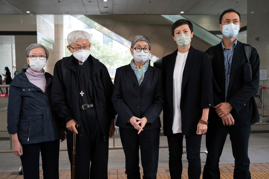 FILE -From left, former lawmaker Cyd Ho, Cardinal Joseph Zen, barrister Margaret Ng, singer Denise Ho and scholar Hui Po-keung pose for a photograph outside of the West Kowloon Magistrates's Courts after the verdict session in Hong Kong, Nov. 25, 2022. (AP Photo/Anthony Kwan, File)