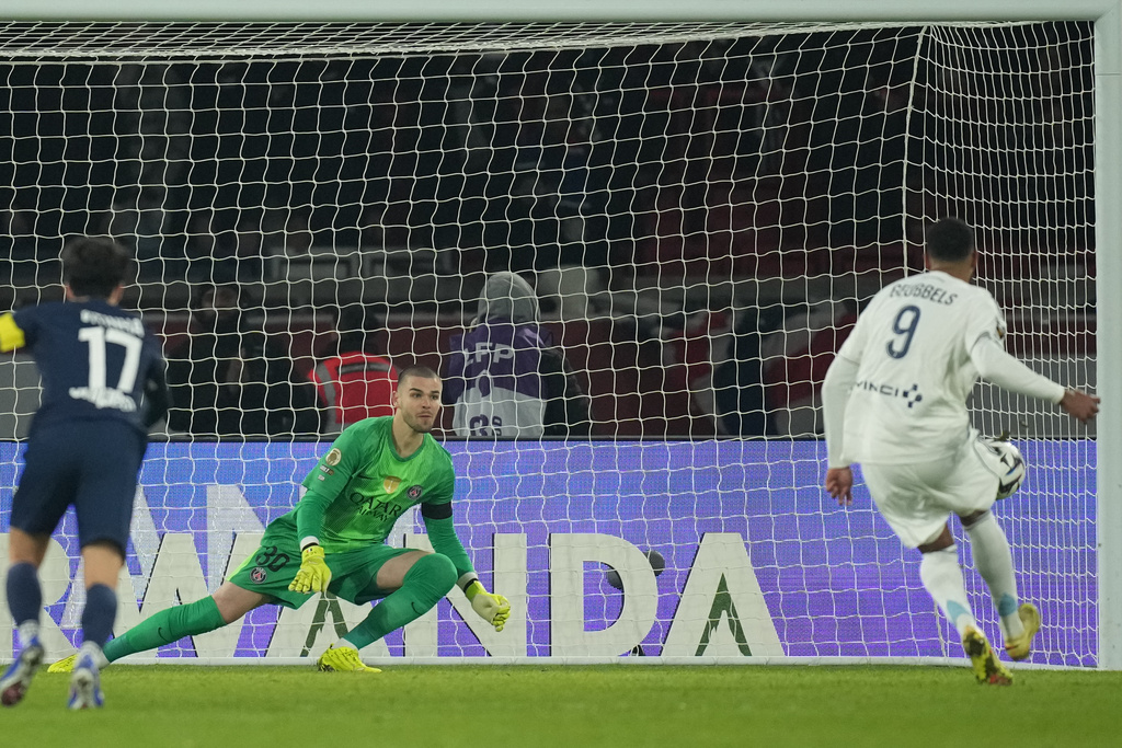 Paris FC's Willem Geubbrls scores during the French Ligue 1 soccer match between Paris Saint-Germain and Paris FC in Paris, Sunday, Jan. 4, 2026. (AP Photo/Christophe Ena)