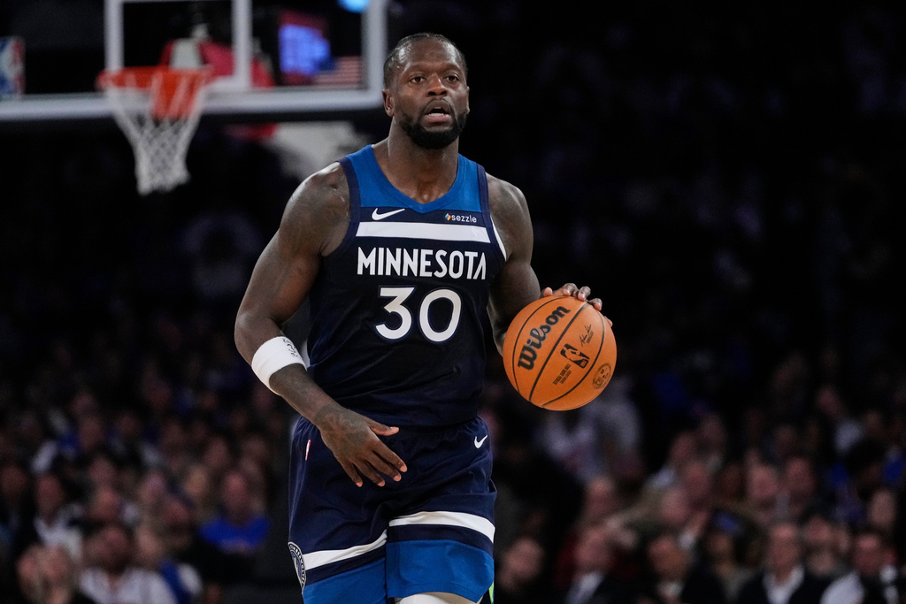 Minnesota Timberwolves' Julius Randle (30) looks to pass during the first half of an NBA basketball game against the New York Knicks Wednesday, Nov. 5, 2025, at Madison Square Garden in New York. (AP Photo/Frank Franklin II)