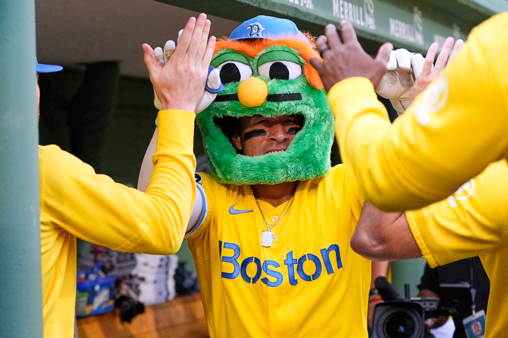 Boston Red Sox's Jahmai Jones celebrates after his two-run home run in the second inning of a baseball game against the Tampa Bay Rays, Saturday, July 18, 2026, in Boston. (AP Photo/Charles Krupa)