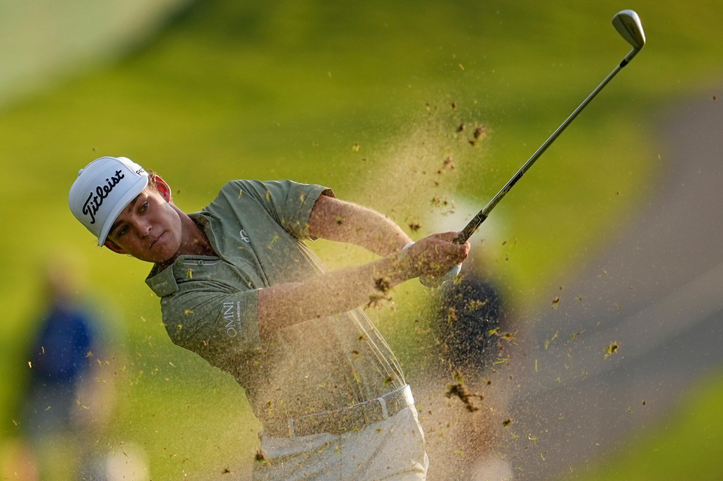 Jackson Koivun watches his ball on the first hole during the first round of the St. Jude Championship golf tournament, Thursday, Aug. 13, 2026, in Memphis, Tenn. (AP Photo/George Walker IV)