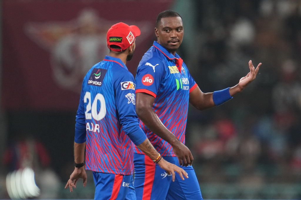 Delhi Capitals' Lungi Ngidi, right, listens to captain Axar Patel before bowling his next delivery during the Indian Premier League cricket match between Lucknow Super Giants and Delhi Capitals in Lucknow, India, Wednesday, April 1, 2026. (AP Photo/Manish Swarup)