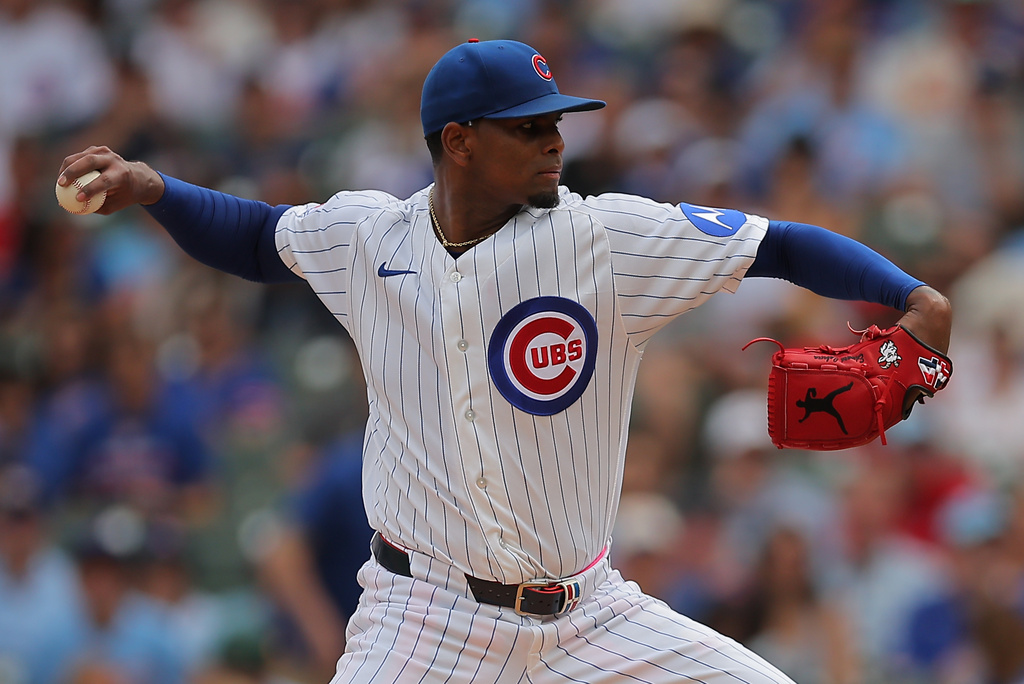 Chicago Cubs starting pitcher Edward Cabrera throws during the first inning of a baseball game against the St. Louis Cardinals, Sunday, Aug. 16, 2026, in Chicago. (AP Photo/Melissa Tamez)