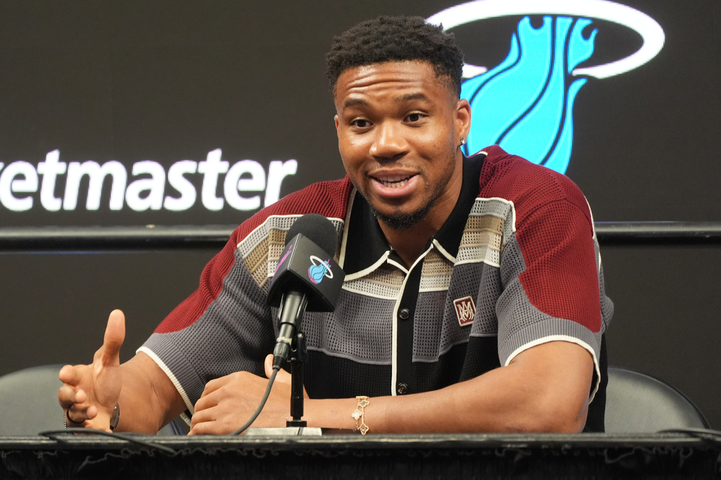 Giannis Antetokounmpo speaks during a news conference where he was introduced as a new member of the Miami Heat team Thursday, July 16, 2026, in Miami. (AP Photo/Marta Lavandier)