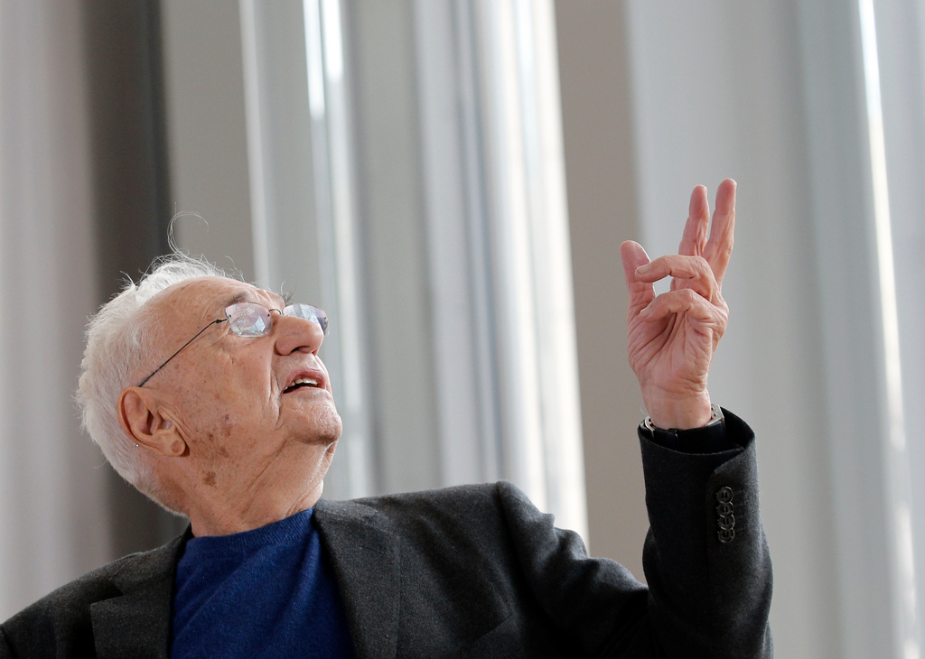 FILE - American architect Frank Gehry speaks to journalists during the press day of his latest creation, the Louis Vuitton Foundation art museum and cultural center, in Paris, Oct. 17, 2014. (AP Photo/Christophe Ena, File)