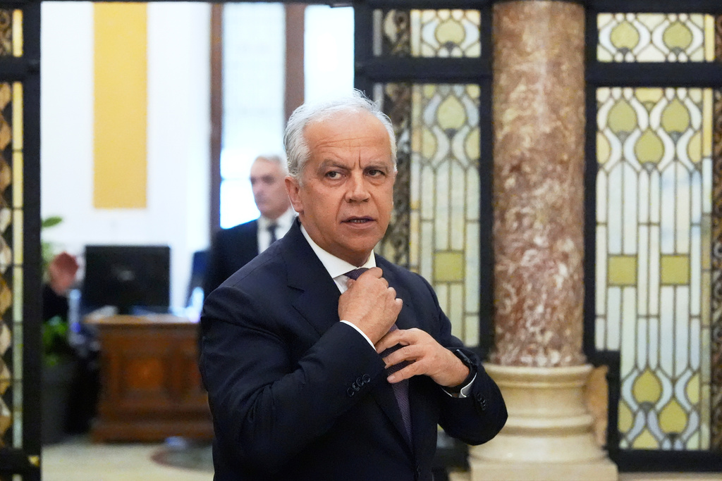 FILE - Italian Interior Minister Matteo Piantedosi waits for U.S. Homeland Security Secretary Kristi Noem, at the Viminale Interior Ministry headquarters, Friday, May 23, 2025, in Rome. (AP Photo/Alex Brandon, Pool, File)