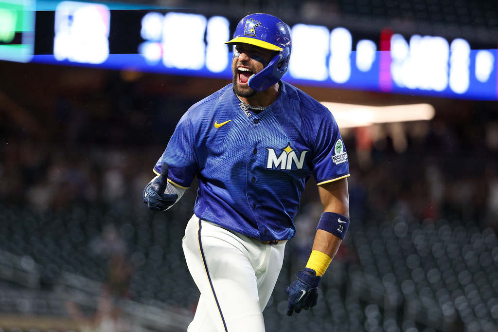 Minnesota Twins' Royce Lewis celebrates his solo home run against the St. Louis Cardinals during the eighth inning of a baseball game, Friday, June 12, 2026, in Minneapolis. (AP Photo/Matt Krohn)
