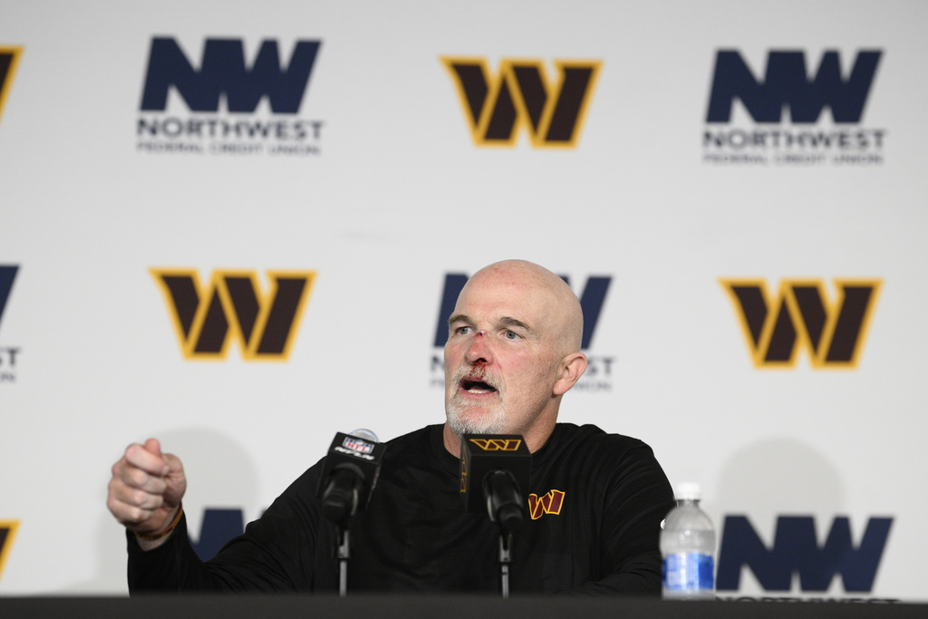 Washington Commanders Dan Quinn speaks during a news conference after an NFL football game against the Las Vegas Raiders, Sunday, Sept. 21, 2025, in Landover, Md. (AP Photo/Nick Wass)