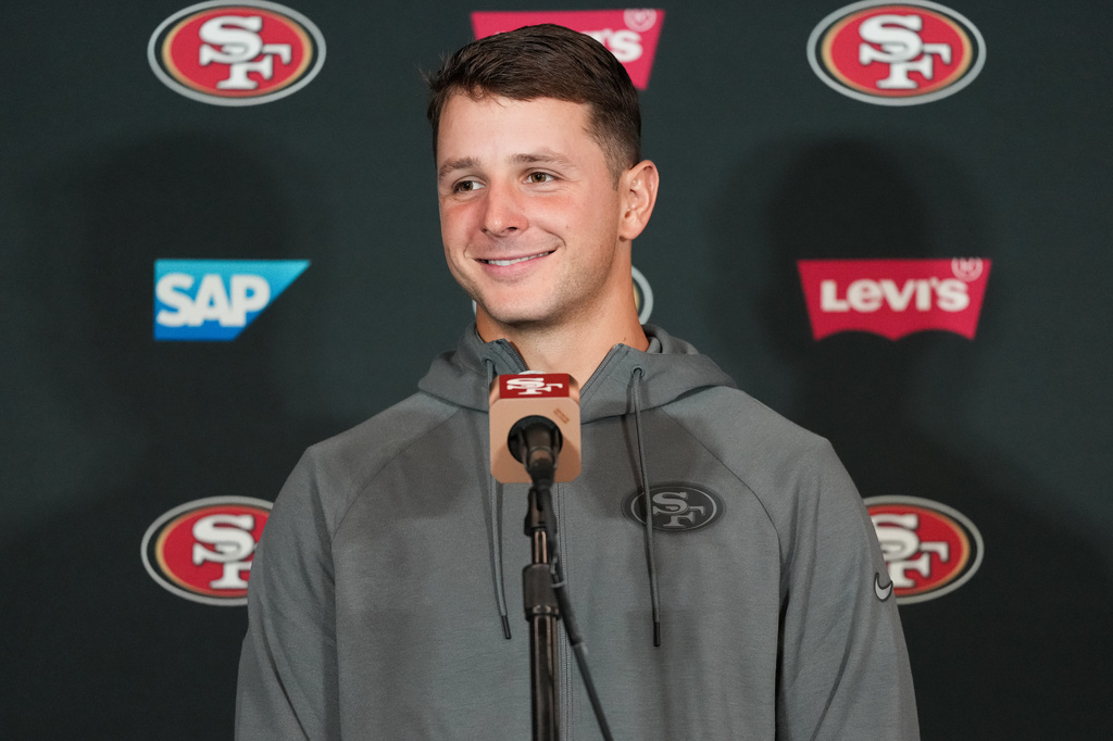 San Francisco 49ers quarterback Brock Purdy speaks to the media following a practice Tuesday, Sept. 8, 2026, in Melbourne, Australia, in preparation for an NFL football game against the Los Angeles Rams. (AP Photo/Asanka Brendon Ratnayake)