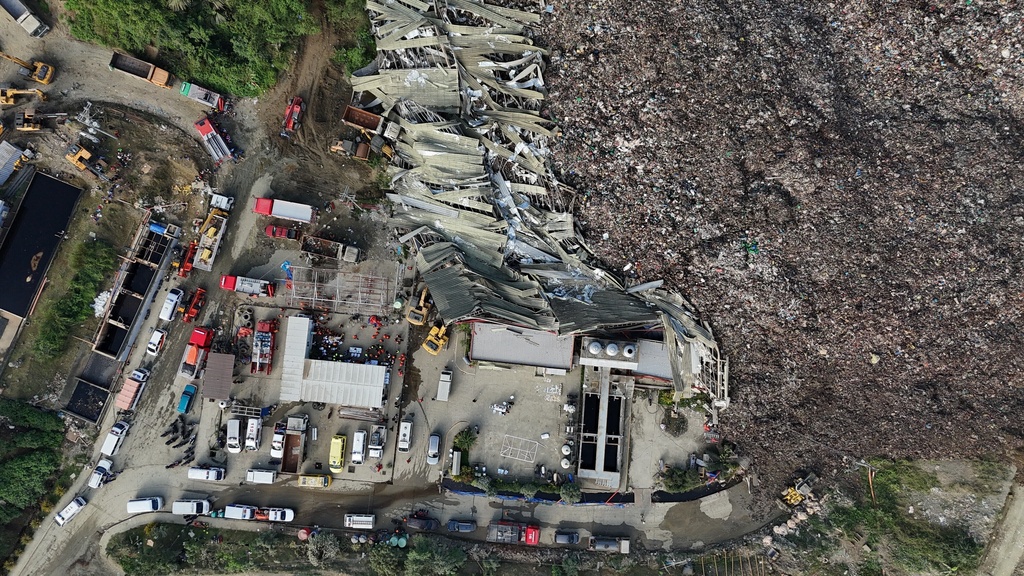 An aerial view after a huge mound of garbage collapsed at a waste segregation facility in Binaliw, Cebu city on Friday, Jan. 9, 2026. (AP Photo/Jacqueline Hernandez)