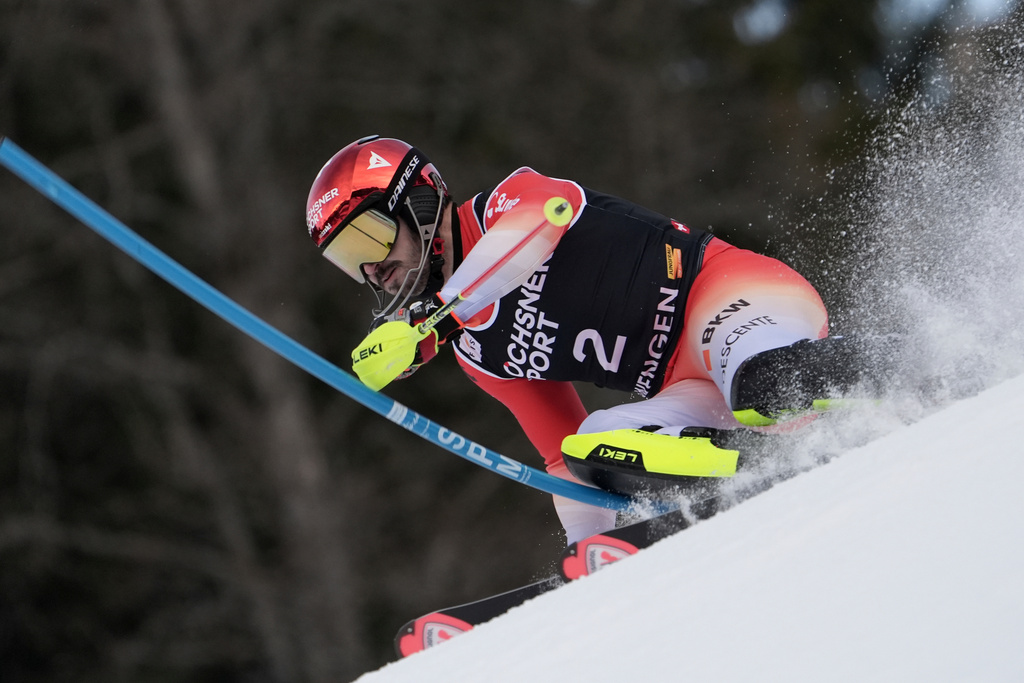 Switzerland's Loic Meillard competes in an alpine ski, men's World Cup slalom, in Wengen, Switzerland, Sunday, Jan. 18, 2026. (AP Photo/Giovanni Zenoni)