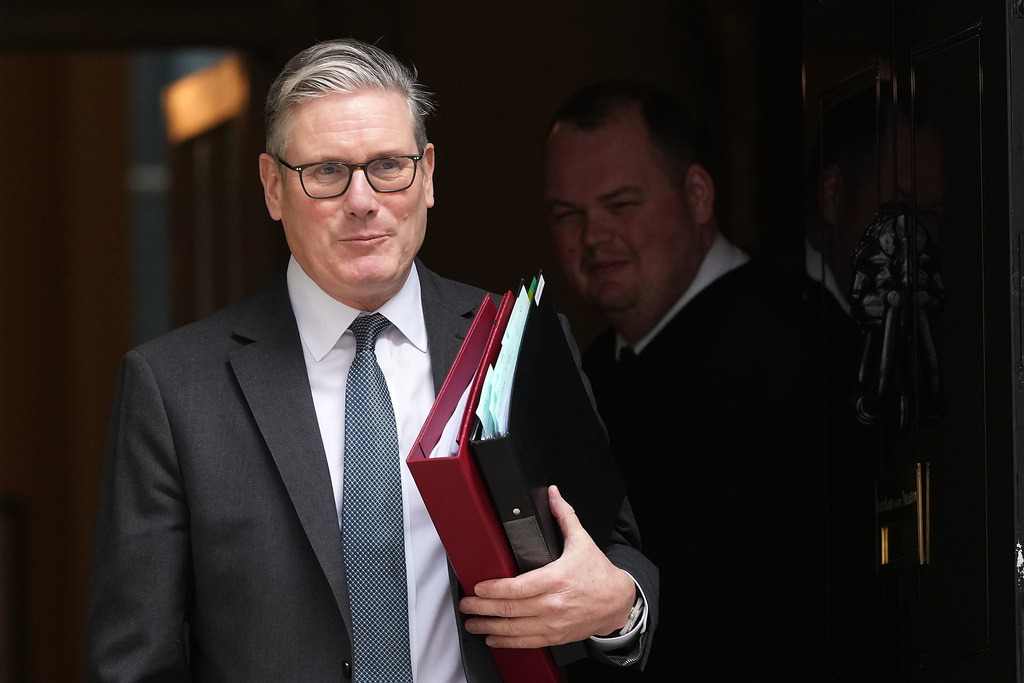 Britain's Prime Minister Keir Starmer leaves 10 Downing Street to attend the weekly Prime Ministers' Questions session in parliament in London, Wednesday, March 11, 2026. (AP Photo/Frank Augstein)