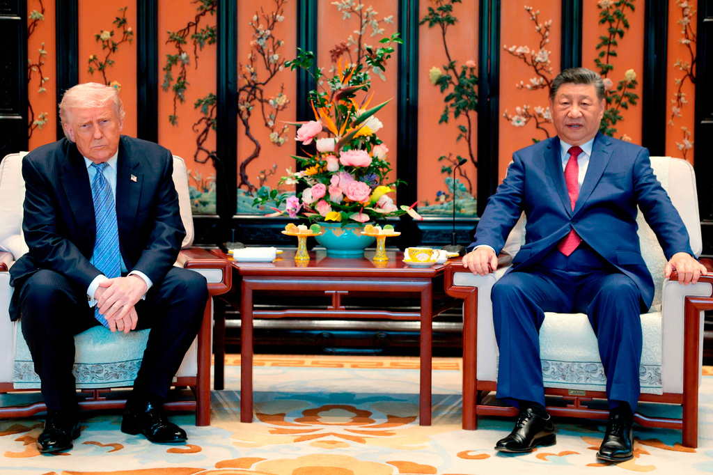 FILE - Chinese President Xi Jinping, right, and President Donald Trump attend a meeting on the sidelines of their visit to the Zhongnanhai Garden in Beijing, May 15, 2026. (Evan Vucci/Pool Photo via AP, File)