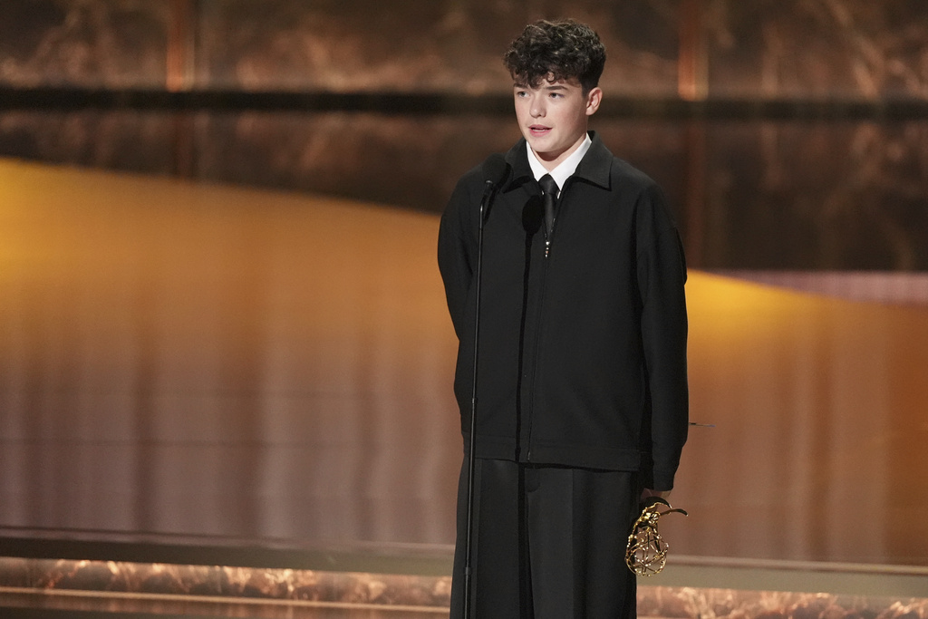 Owen Cooper accepts the award for outstanding supporting actor in a limited or anthology series or movie for "Adolescence" during the 77th Primetime Emmy Awards on Sunday, Sept. 14, 2025, at the Peacock Theater in Los Angeles. (AP Photo/Chris Pizzello)