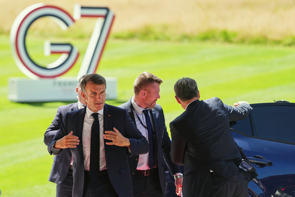 French President Emmanuel Macron arrives for the G7 summit in Evian-les-Bains, France, Monday, June 15, 2026. (AP Photo/Thibault Camus)