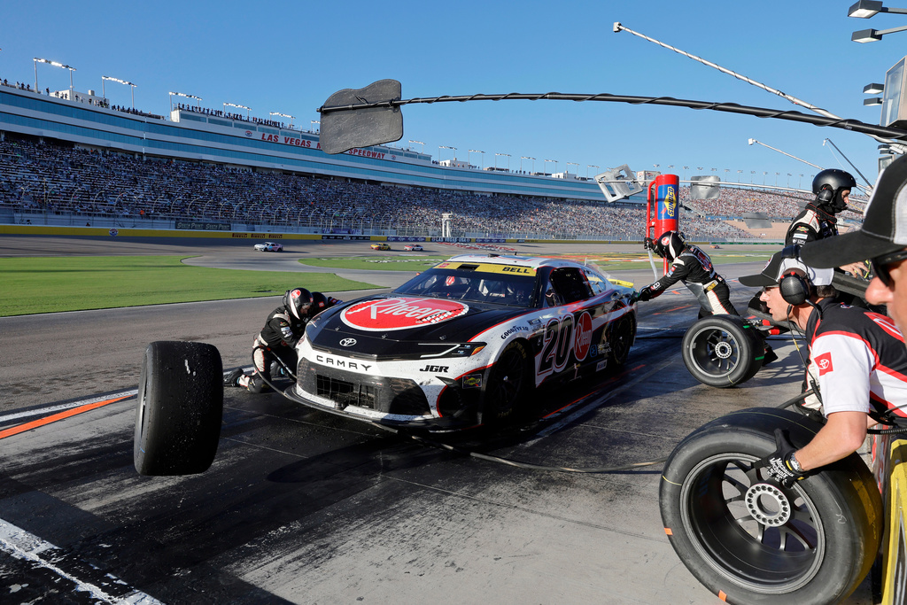 Driver Christopher Bell makes a pit stop during a NASCAR Cup Series auto race Sunday, Oct. 12, 2025, in Las Vegas. (AP Photo/Steve Marcus)