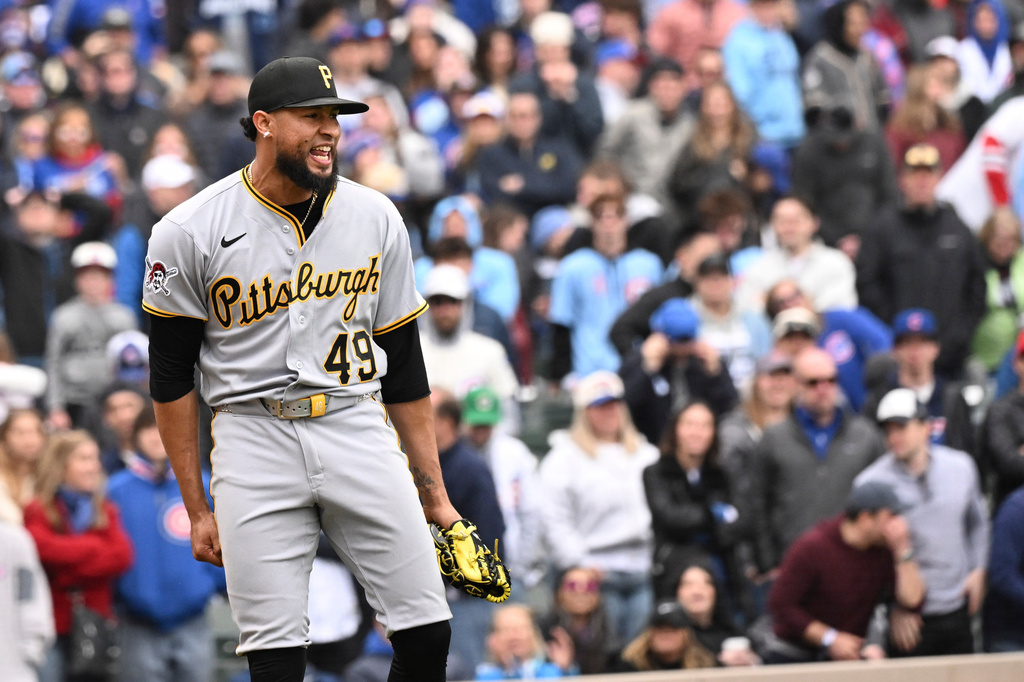 Pittsburgh Pirates pitcher Yohan Ramírez celebrates after a baseball game against the Chicago Cubs, Saturday, April 11, 2026, in Chicago. (AP Photo/Matt Marton)