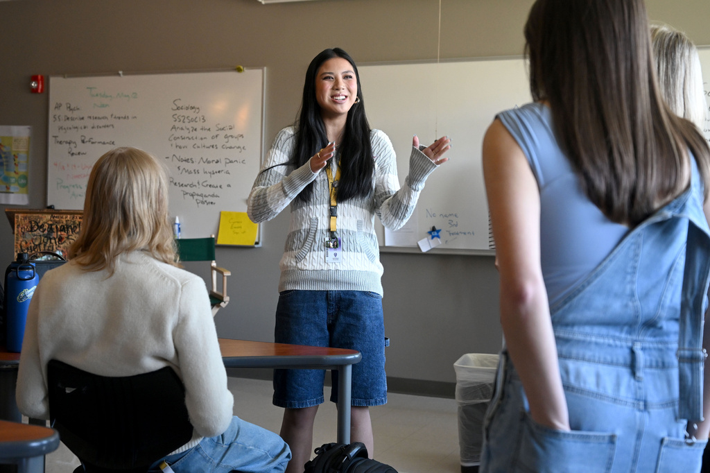 Fayetteville High senior Lily Alder, center, president of the Young Democrats of Arkansas, talks with the other officers during a meeting Tuesday April, 7, 2026 in Fayetteville, Ark. (AP Photo/Michael Woods)